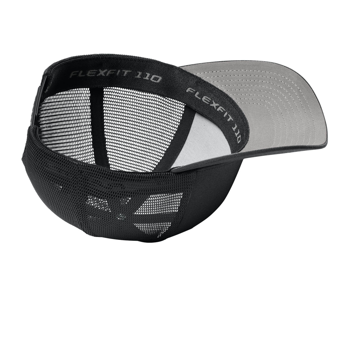 Black Flexfit 110M trucker hat, interior view showing hat construction. variant-black